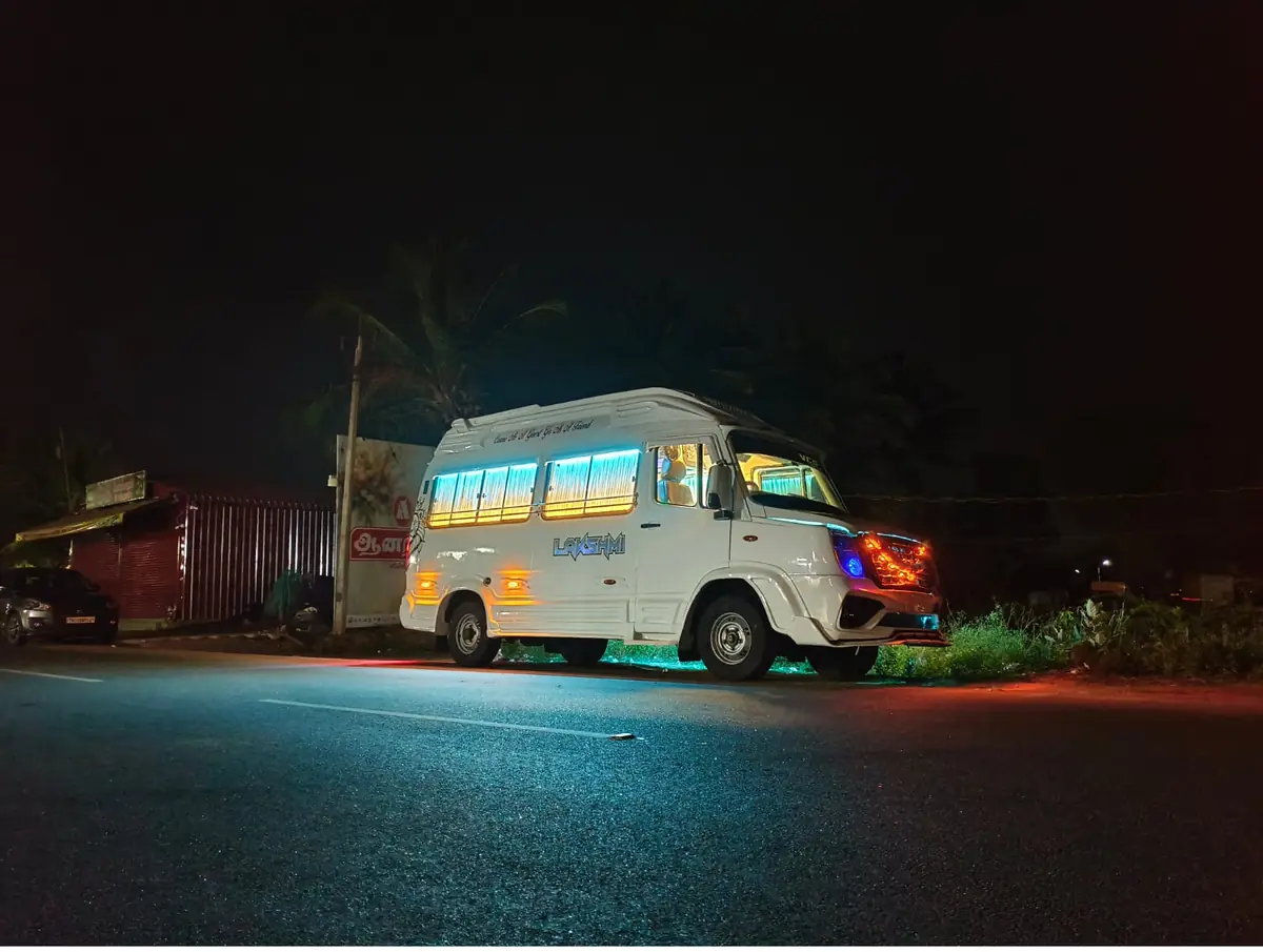 Illuminated VCS Tempo Traveller at night