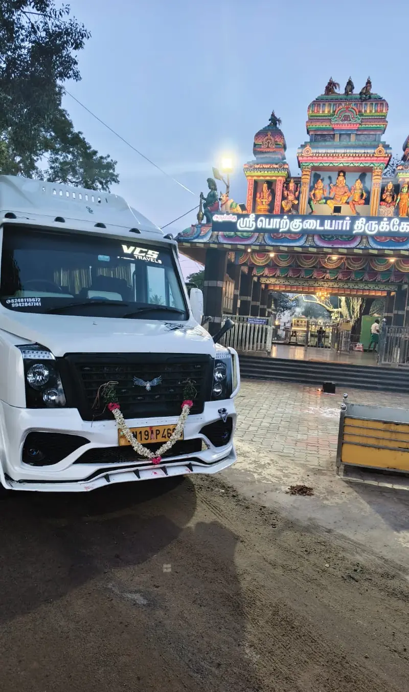 VCS Tempo Traveller at a temple